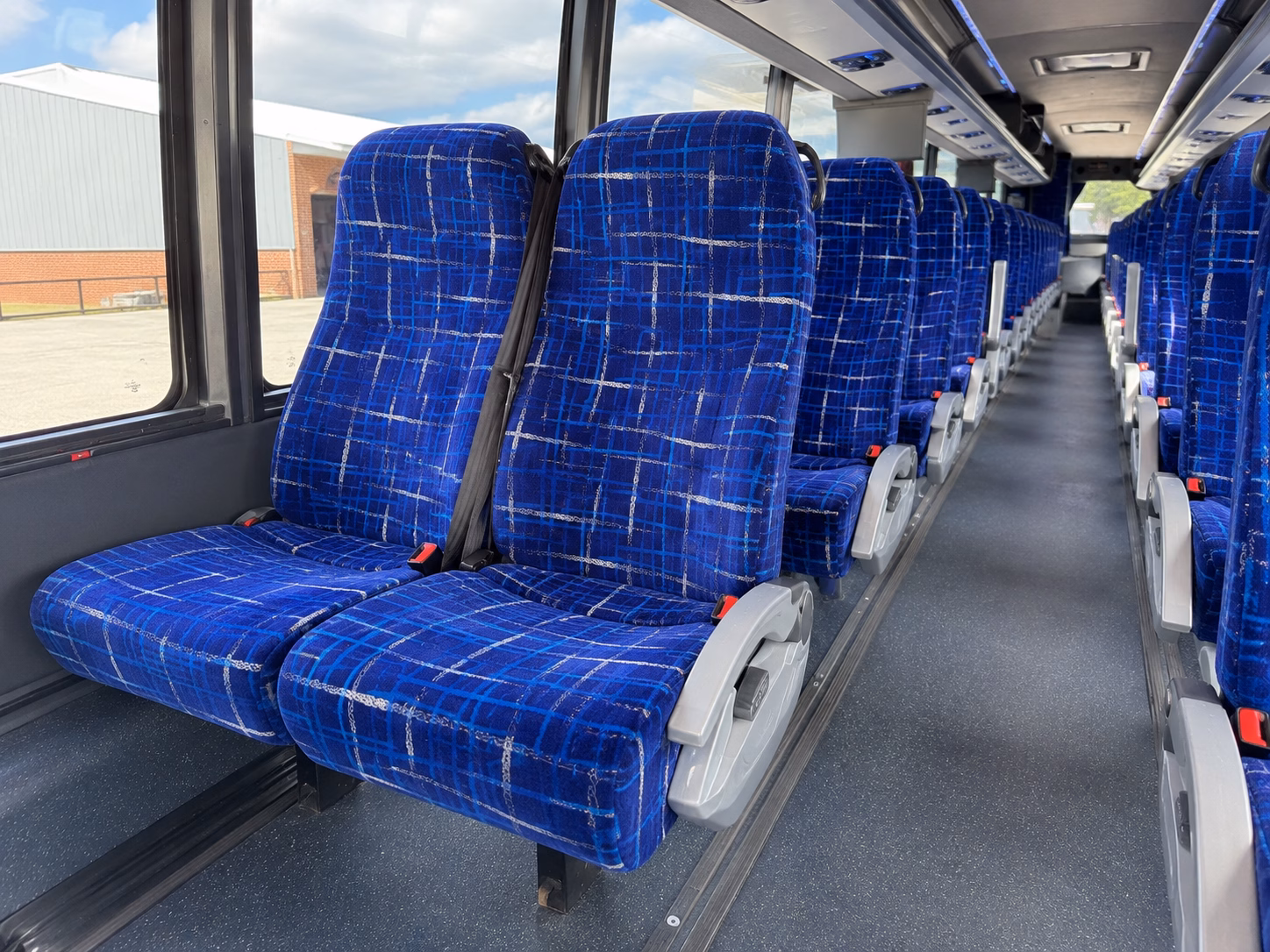 how seasonality and peak times affect charter bus rates in livonia michigan